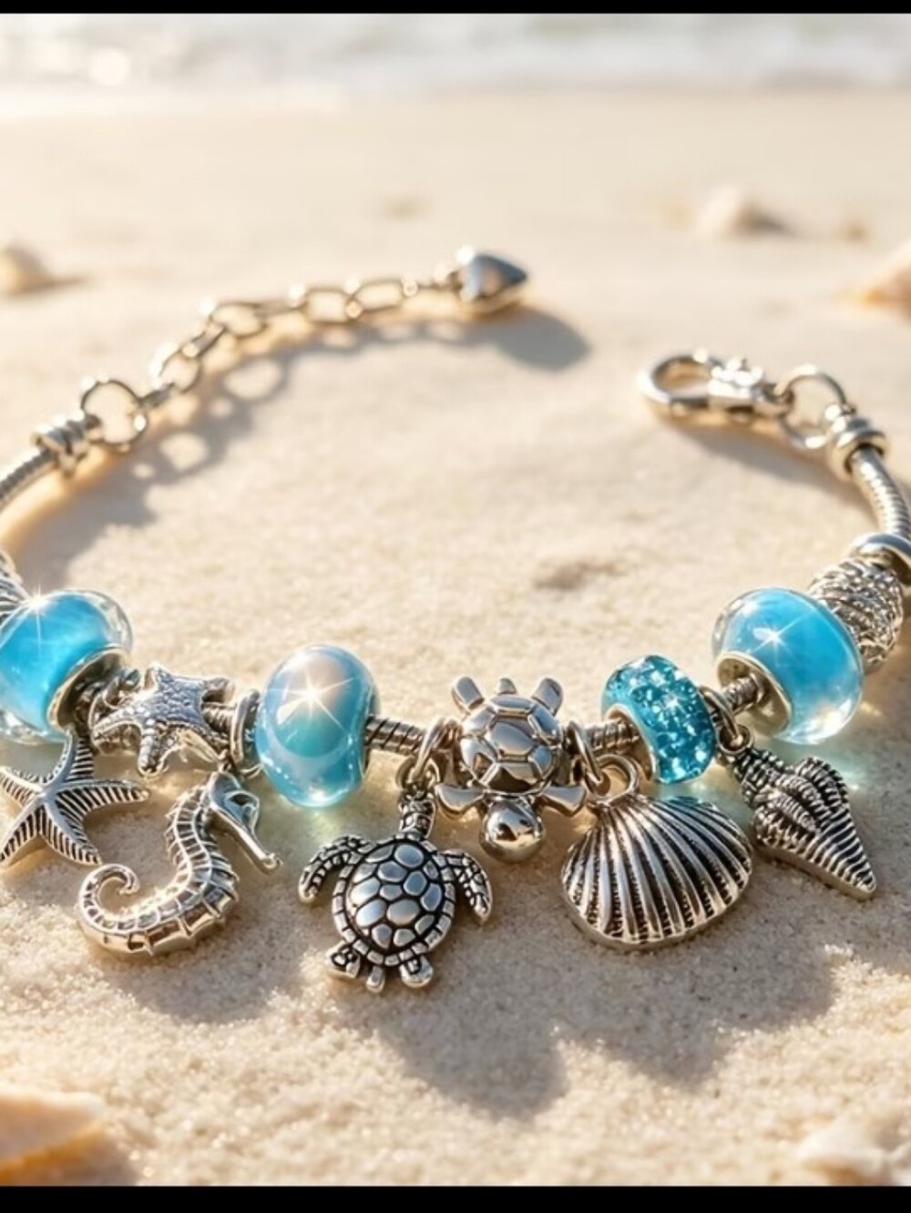 Silver Tone Sea Charm Bracelet with Blue Beads